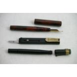 Two unusual fountain pens and a nib sharpener/shap