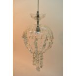 A pair of glass ceiling lights with clear glass dr