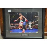 A framed and signed Manny Pacquiao boxing picture