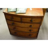 A Victorian bow fronted chest of drawers fitted wi