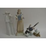 Four Lladro models comprising a large figure of a