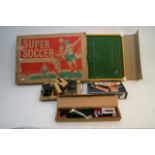 A boxed Super Soccer game, a boxed Binatone TV gam