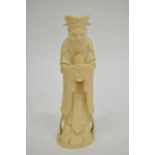 A Chinese carved antique ivory figure of a courtly