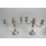 A pair of silver plated double branch candelabra.