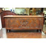 A 17th Century planked chest with carved decoratio