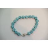 An 18ct white gold, turquoise and diamond bracelet.
