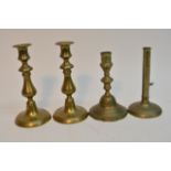A 19th century French engraved brass candlestick,