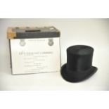 A boxed vintage top hat made by the City Cork Hat