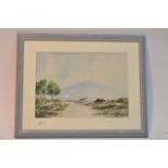 A framed watercolour painting depicting The Mourne