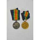 Two WW2 medals inscribed '119704 GNR J.H Williams
