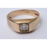 A 9ct Gold Gents ring inset with Diamond