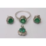 A 14ct white gold, emerald and diamond suite compr