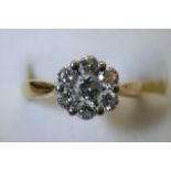 An 18ct yellow gold diamond cluster ring with cert