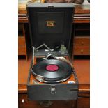 An HMV gramophone and records.