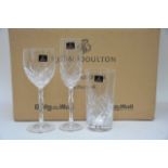 A boxed Royal Doulton dinner service and boxed Dou