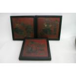 Three framed oriental type wooden wall hangings wi