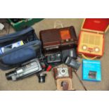 A collection of items including a bakelite radio,