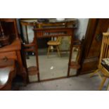 An Edwardian over mantel mirror inset with four mi