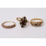 Three gold rings set with Ruby's diamonds garnets