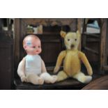 A vintage A&M doll and a teddy bear (2).