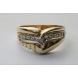 A 14ct yellow gold and diamond set dress ring