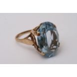 A 9ct gold ring inset with Topaz
