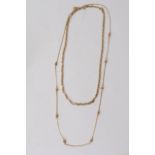 A 9ct gold necklace (10 grams) ad a gold tone unma