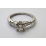 A quality platinum ladies ring, the central diamon