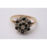 A boxed 9ct gold cluster ring