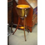 A reproduction inlaid jardiniere stand