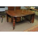 A Victorian Mahogany extending dining table, the o