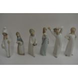 A collection of six Lladro small figures