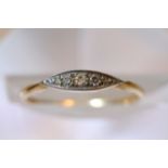 An 18ct gold ring set with old cut chip stone diam