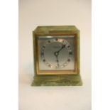 An Elliott green marble mantle clock by M.Chapman