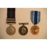 A WW1 medal, a George V Middle Eastern medal two b