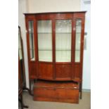 An Edwardian Mahogany display cabinet with a pair