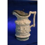 A Victorian white glazed stoneware Bacchus jug dec