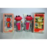 Two boxed 'Mr Smash' clockwork walking Martian rob