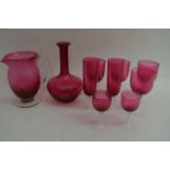 A collection of matching Cranberry glass items com