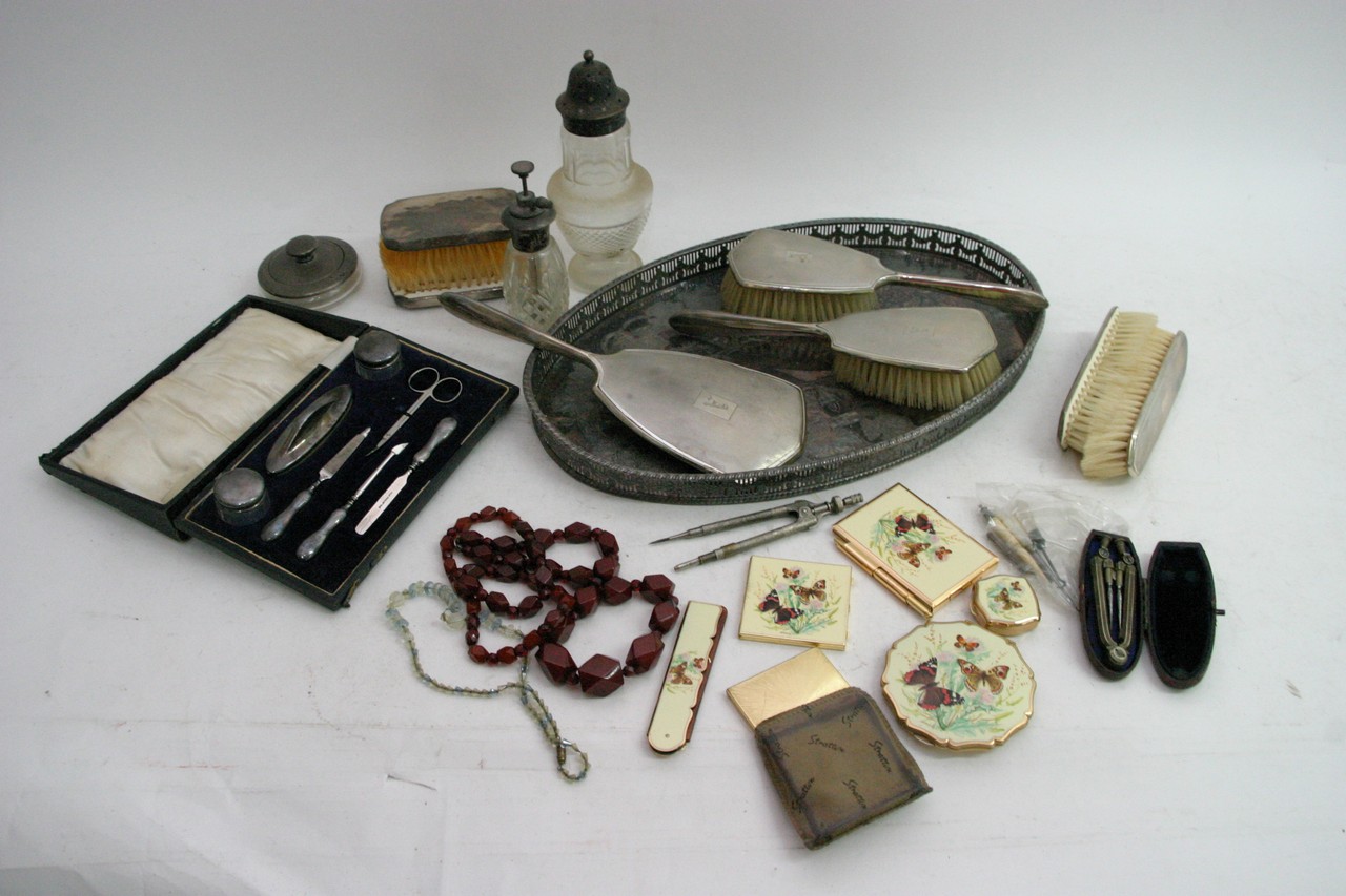 A silver backed dressing table set, manicure set,
