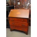 An Edwardian Mahogany Bureau the fall front above