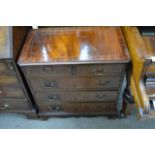 A reproduction mahogany chest of drawers fitted wi