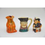 A C.H. Brannam toby jug and two others (3).