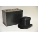 A vintage Dunn and Co. silk top hat in original bo