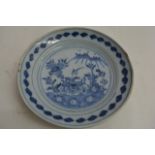 An 18th century English Delft shallow dish, painte