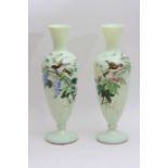 A pair of Victorian opaline glass vases with hand