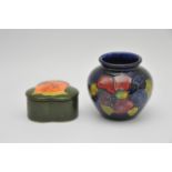 A small Moorcroft 'Clematis' pattern vase and a sh