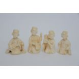 A group of Four small Japanese Okimono figures of