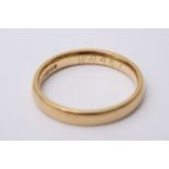 An 18ct gold wedding band