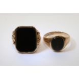 A 9ct gold onyx tablet ring and a 9ct gold oval bloodstone ring (2).